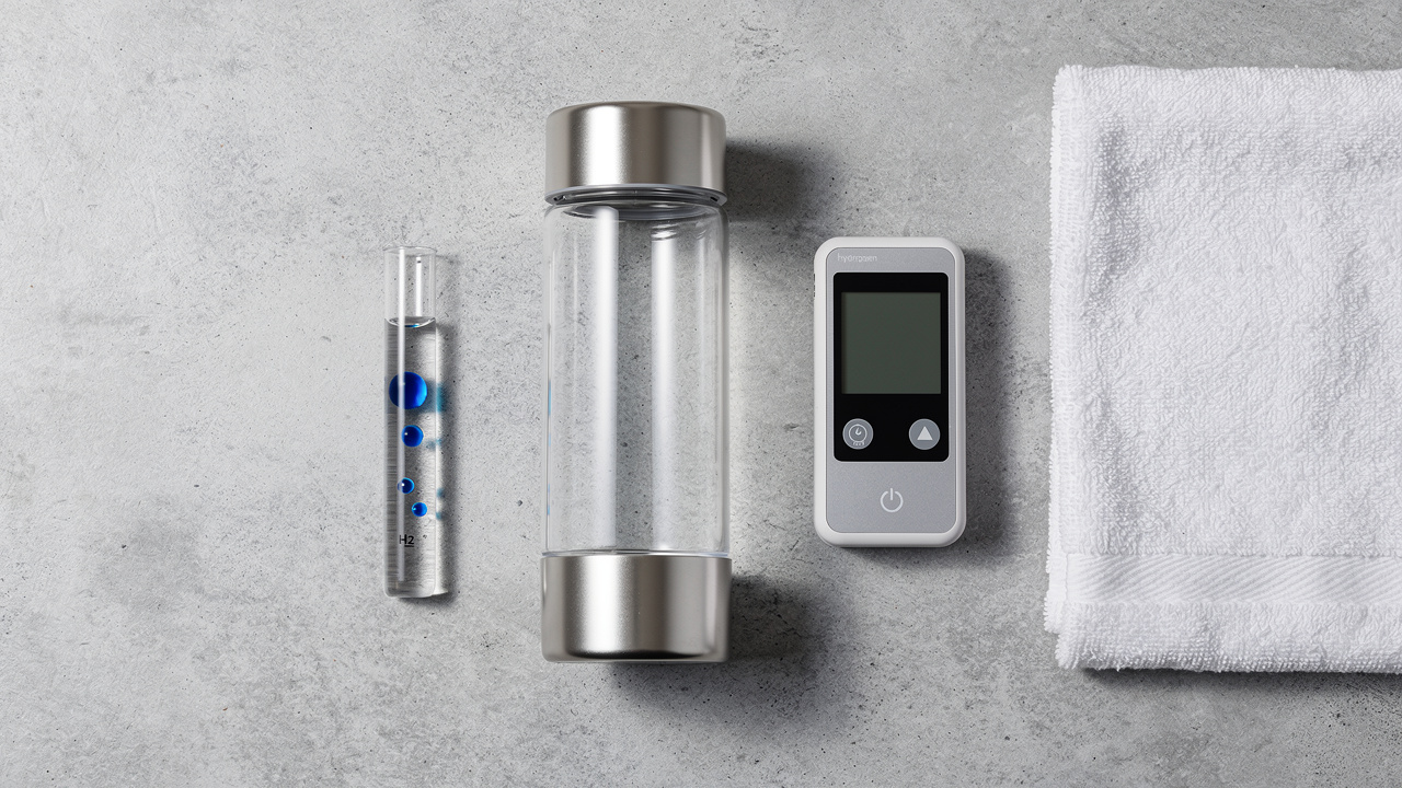 Hydrogen water testing tools and portable bottle flat lay
